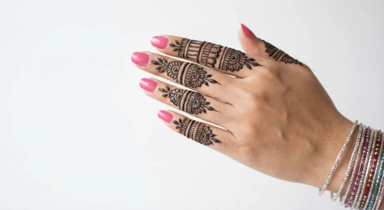 Finger mehndi design with elegant finger art and floral henna patterns