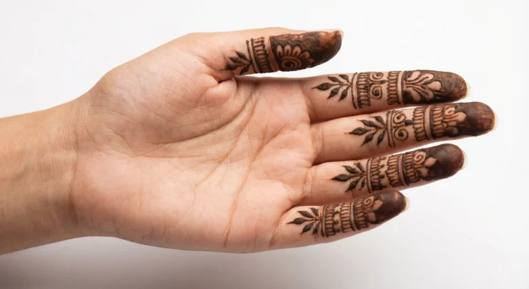 Modern look finger mehndi design with elegant floral henna patterns